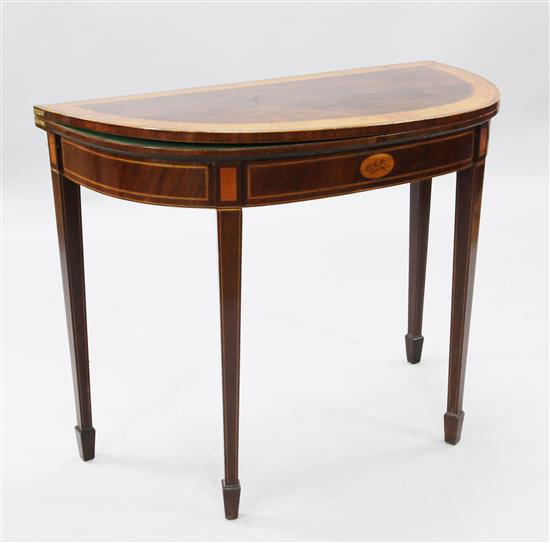 George III satinwood banded mahogany D shaped card table(-)